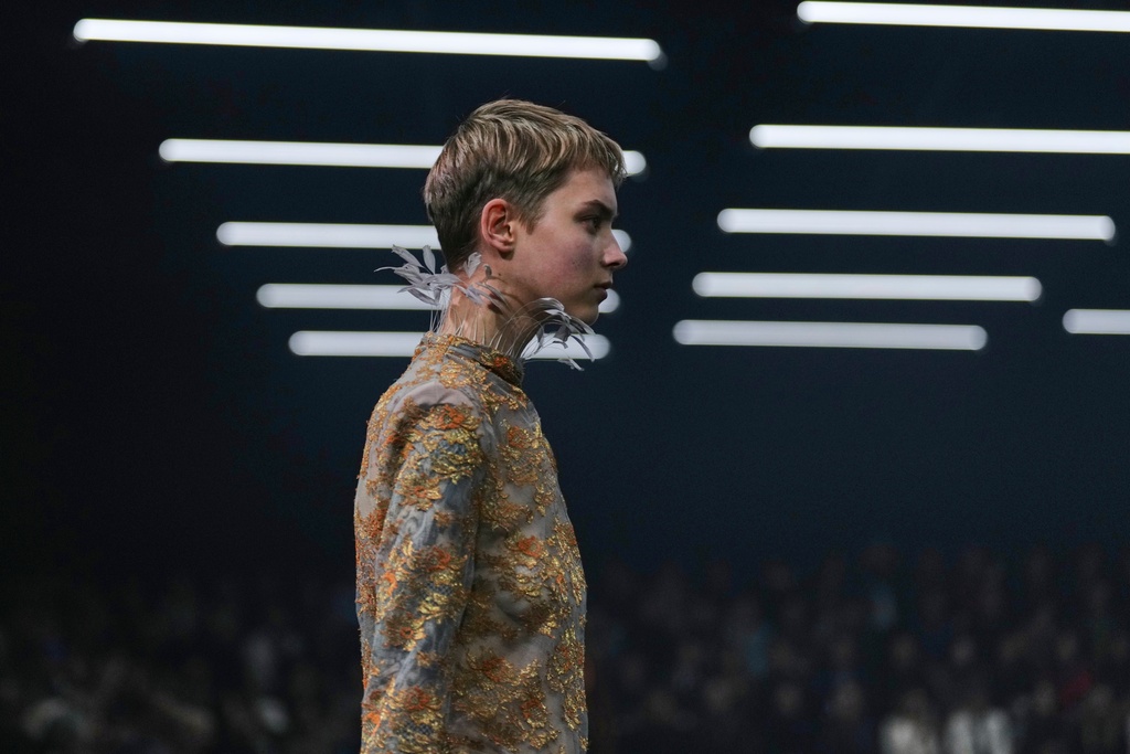A model wears a creation as part of the Valentino Spring/Summer 2026 collection presented in Paris, Sunday, Oct. 5, 2025. (AP Photo/Aurelien Morissard)