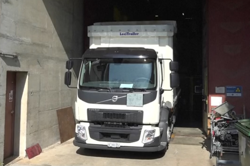 This image, taken from video, shows a truck transporting antiprotons in a first-ever test drive to study antimatter at the European Organization for Nuclear Research, CERN, in Meyrin, near Geneva, Switzerland, March 24, 2026. (AP Photo/Jamey Keaten)