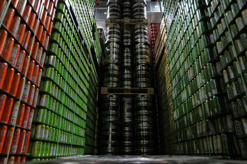 Cans and kegs of craft beer are stored at Pryes Brewing Company in Minneapolis, Wednesday, Aug. 26, 2026. (AP Photo/Ellen Schmidt)