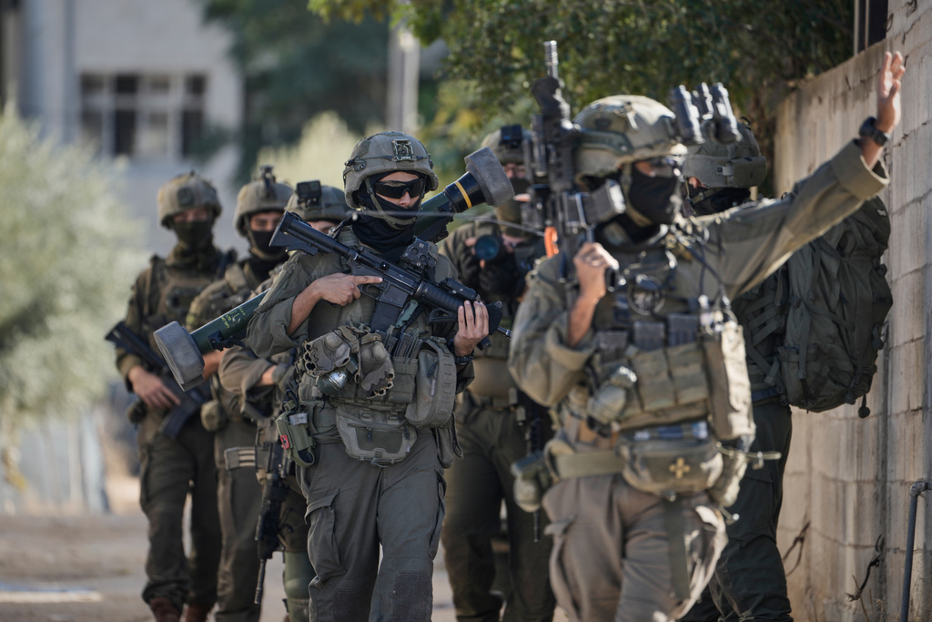 Israeli soldiers are seen during an army raid in the West Bank town of Tubas, Wednesday, Nov. 26, 2025. (AP Photo/Majdi Mohammed)