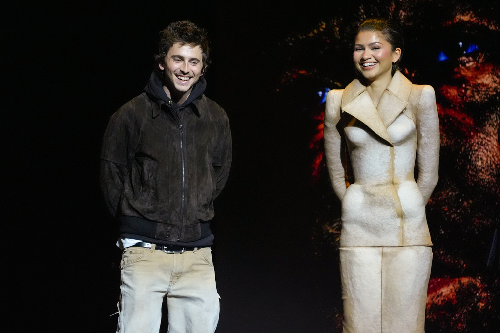 Cast members Timothee Chalamet, left, and Zendaya of the upcoming film "Dune: Part Three" speak during the Warner Bros. presentation at CinemaCon on Tuesday, April 14, 2026, at Caesars Palace in Las Vegas. (AP Photo/Chris Pizzello)