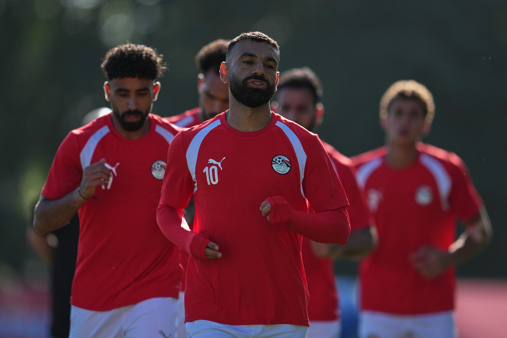 Egypt's Mohamed Salah, front, works out with teammates during a training session Saturday, June 20, 2026, on the eve of the team's World Cup Group G soccer match against New Zealand in Vancouver, British Columbia. (AP Photo/Abbie Parr)