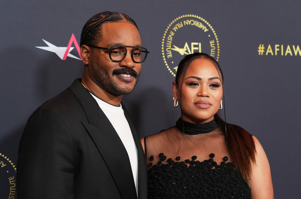 Director Ryan Coogler, left, and his wife Zinzi Evans pose together at the AFI Awards on Friday, Jan. 9, 2026, at the Four Seasons in Los Angeles. (AP Photo/Chris Pizzello)