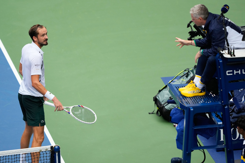 Daniil Medvedev, of Russia, left, talks with the official during the second round of the U.S. Open tennis championships against Sebastian Gorzny, of the United States, Wednesday, Sept. 2, 2026, in New York. (AP Photo/Yuki Iwamura)