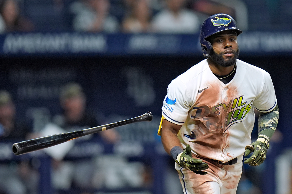 Tampa Bay Rays' Cedric Mullins drops his bat after hitting a home run off Miami Marlins pitcher Janson Junk during the sixth inning of a baseball game Friday, May 15, 2026, in St. Petersburg, Fla. (AP Photo/Chris O'Meara)