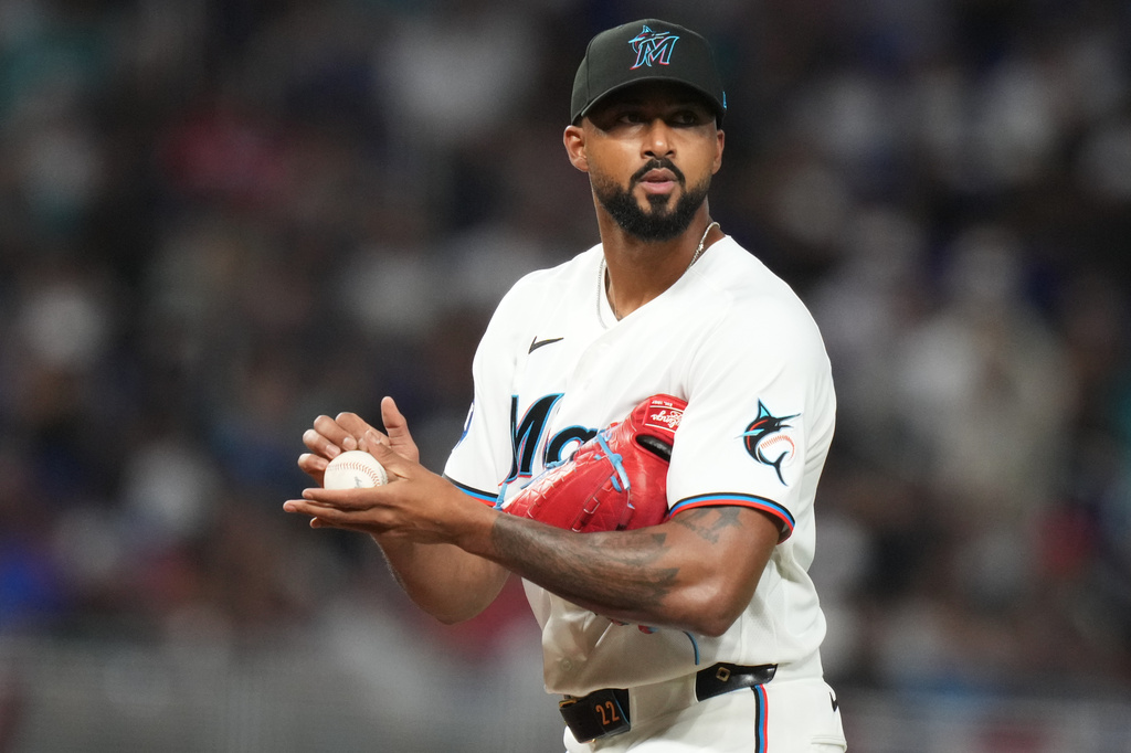 Miami Marlins pitcher Sandy Alcantara stand son the mound during the fourth inning of a baseball game against the Colorado Rockies, Friday, March 27, 2026, in Miami. (AP Photo/Lynne Sladky)