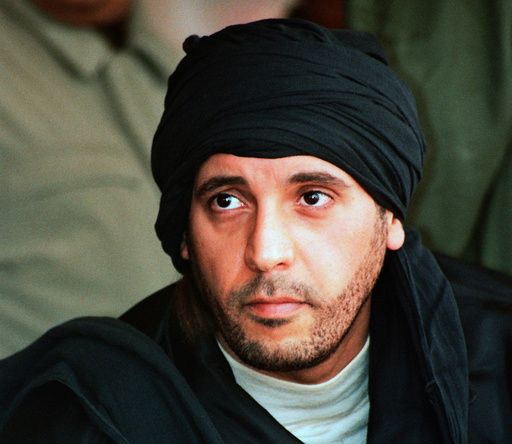 FILE - In this undated file photo made available Sept. 25, 2011, Hannibal Gadhafi, son of ousted Libyan leader Moammar Gadhafi, watches an elite military unit exercise in Zlitan, Libya. (AP Photo/Abdel Magid al-Fergany, File) FILE - In this undated file photo made available Sept. 25, 2011, Hannibal Gadhafi, son of ousted Libyan leader Moammar Gadhafi, watches an elite military unit exercise in Zlitan, Libya. (AP Photo/Abdel Magid al-Fergany, File)
