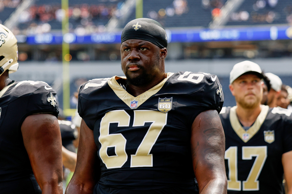 FILE - New Orleans Saints defensive tackle Zxavian Harris attends warmups before an NFL preseason football game against the Los Angeles Rams, Aug. 22, 2026, in Inglewood, Calif. (AP Photo/Caroline Brehman, File)