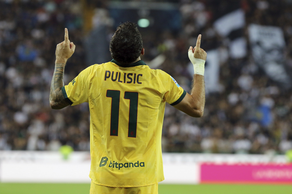 AC Milan's Christian Pulisic celebrates after scoring his team's third goal during the Serie A soccer match between Udinese and AC Milan at the Bluenergy Stadium in Udine, Italy, Saturday, Sept. 20, 2025. (Andrea Bressanutti/LaPresse via AP)