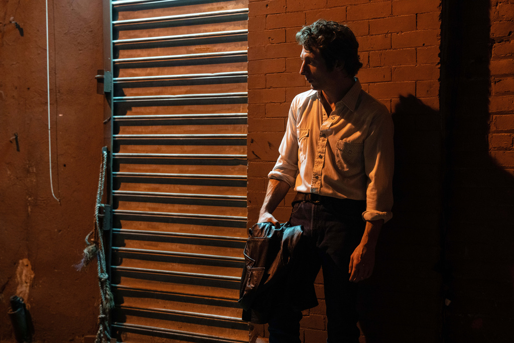 This image released by 20th Century Studios shows Jeremy Allen White as Bruce Springsteen in a scene from "Springsteen: Deliver Me From Nowhere." (Macall Polay/20th Century Studios via AP)