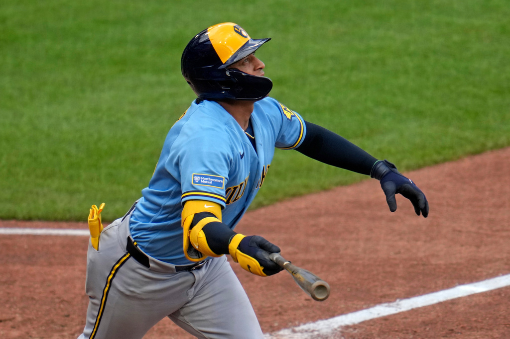 Milwaukee Brewers' Bo Naylor (14) watches his solo home run off Pittsburgh Pirates pitcher Luke Weaver during the eighth inning of a baseball game in Pittsburgh, Thursday, Sept. 17, 2026. (AP Photo/Gene J. Puskar)