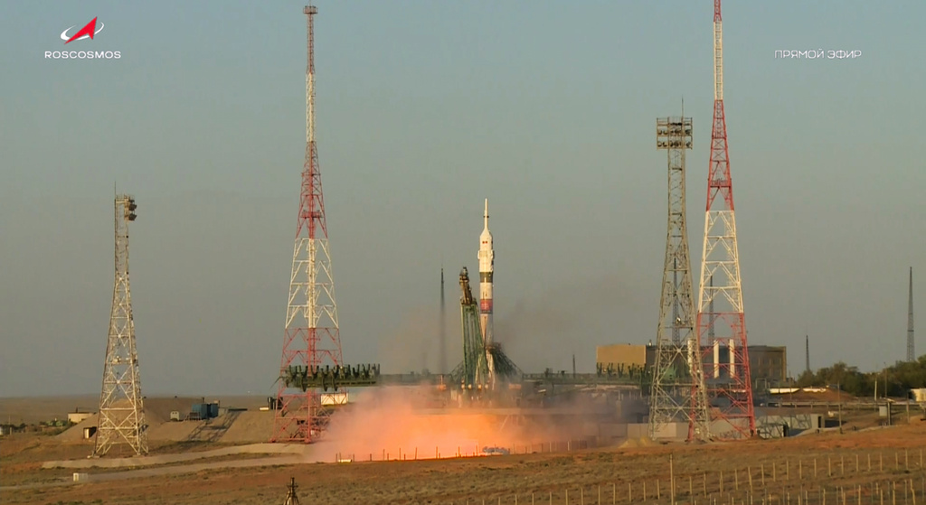 In this photo taken from video released by Roscosmos space corporation, the Soyuz-2.1 rocket booster with Soyuz MS-29 space ship carrying NASA astronaut Anil Menon, Roscosmos cosmonauts Pyotr Dubrov and Anna Kikina, a new crew to the International Space Station, ISS, blasts off in Russian leased Baikonur cosmodrome, Kazakhstan, Tuesday, July 14, 2026. (Roscosmos space corporation, via AP)
