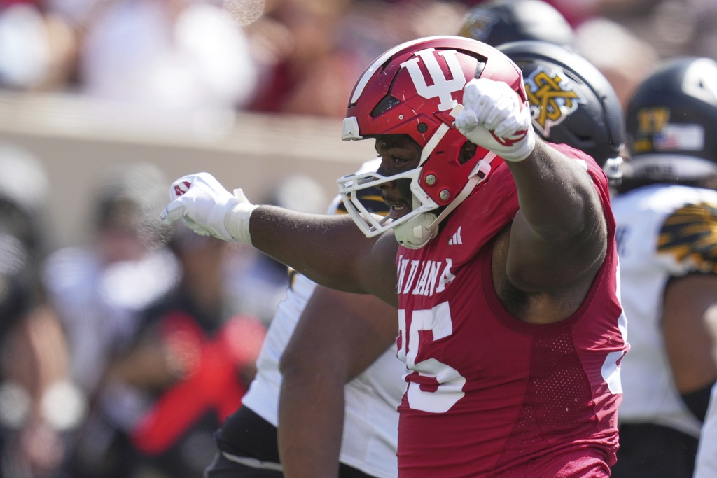 Indiana defensive lineman Tyrique Tucker (95) celebrates a tackled during the first half of an NCAA college football game against Kennesaw State, Saturday, Sept. 6, 2025, in Bloomington, Ind. (AP Photo/Darron Cummings)