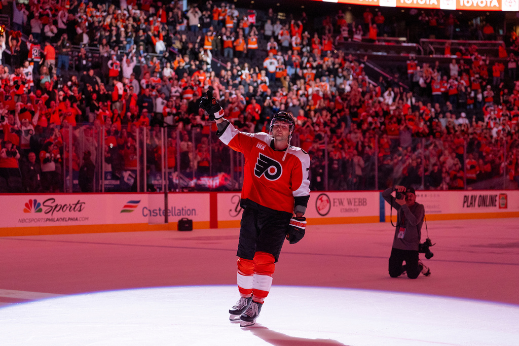 Philadelphia Flyers right winger Tyson Foerster is honored with the first star of the game after an NHL hockey game against the Carolina Hurricanes, Monday, April 13, 2026, in Philadelphia. (AP Photo/Chris Szagola)