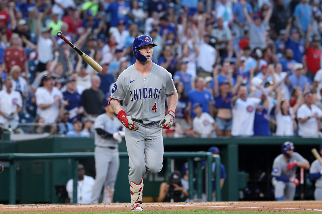 Chicago Cubs' Pete Crow-Armstrong tosses his bat after hitting a home run off of Washington Nationals pitcher Jake Irvin during the third inning of a baseball game, Tuesday, Aug 11, 2026, in Washington. (AP Photo/Terrance Williams)