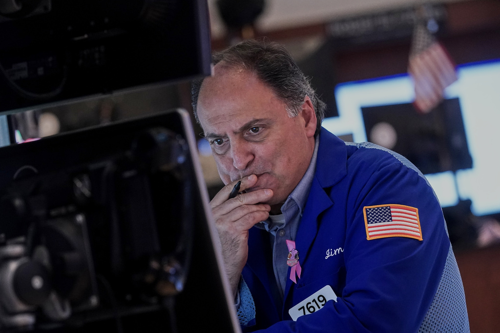 Trader James Conti works on the floor of the New York Stock Exchange, Thursday, Nov. 6, 2025. (AP Photo/Richard Drew)