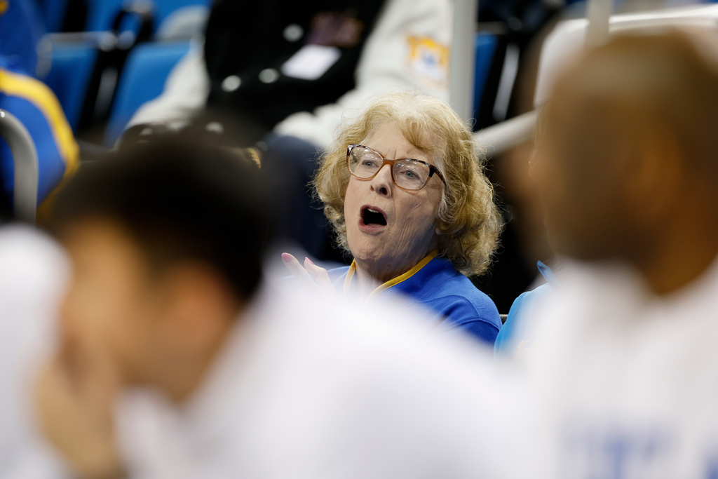 Patti Close, mother of UCLA head coach Cori Close, watches from the stands during the first half of an NCAA college basketball game against Rutgers, Wednesday, Feb. 4, 2026, in Los Angeles. (AP Photo/Caroline Brehman)