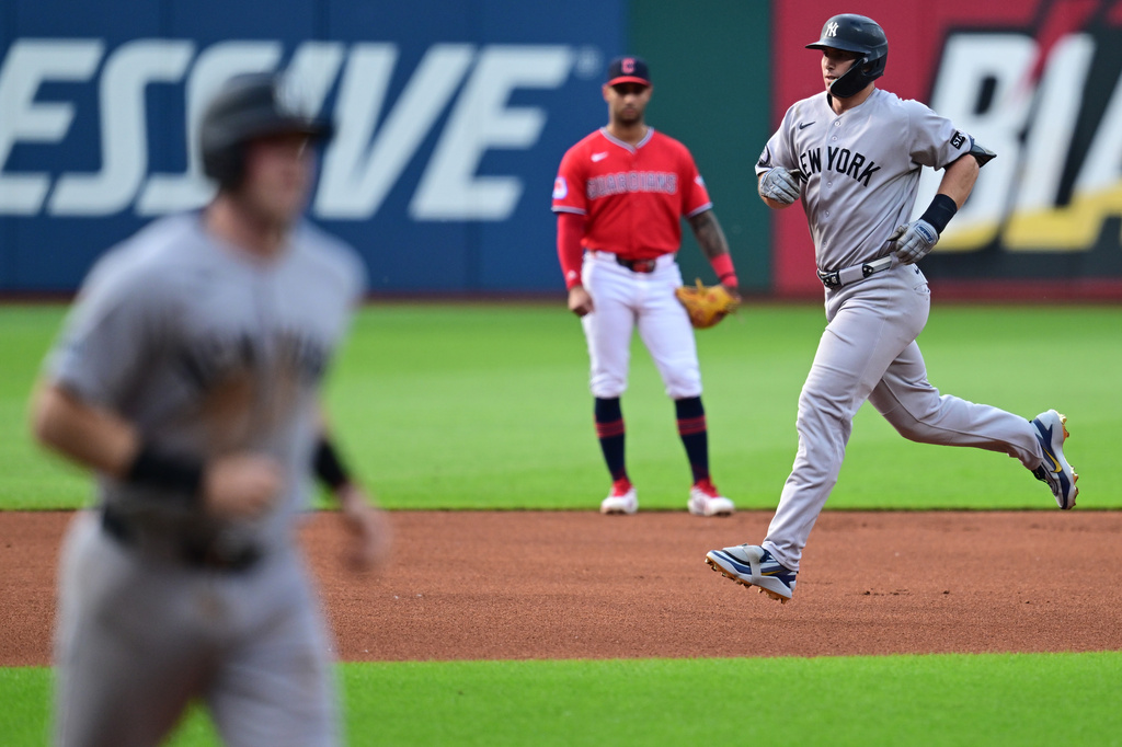 New York Yankees' Paul Goldschmidt, right, runs the bases after hitting a two-run home run off Cleveland Guardians starting pitcher Gavin Williams during the inning of a baseball game, Monday, June 8, 2026, in Cleveland. (AP Photo/David Dermer)