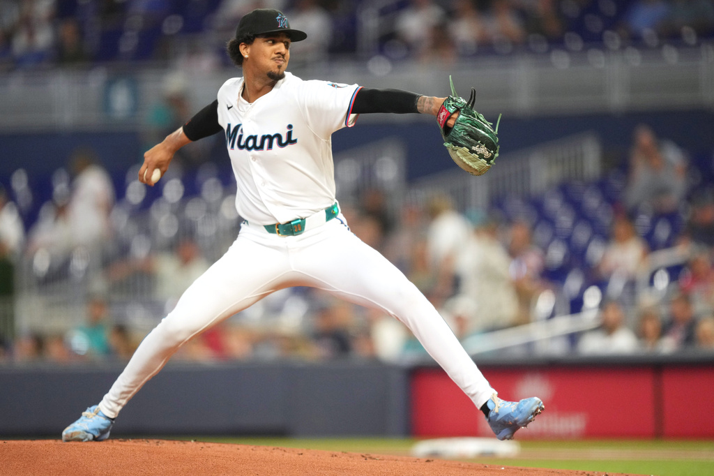 Miami Marlins starting pitcher Eury Pérez throws during the first inning of a baseball game against the Cleveland Guardians, Saturday, July 11, 2026, in Miami. (AP Photo/Jim Rassol)