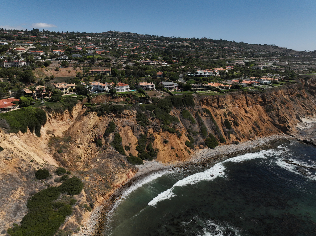A landslide on a coastal bluff is shown from an aerial view on Tuesday, Sept. 30, 2025, in Rancho Palos Verdes, Calif. (AP Photo/Jae C. Hong)
