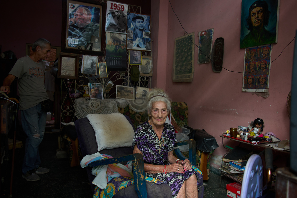 Teresita del Rosario González Ricardo poses for a photo, accompanied by her son José Manuel Borroto, at her home in Havana, Cuba, Sunday, Sept. 6, 2026. (AP Photo/Ramon Espinosa)