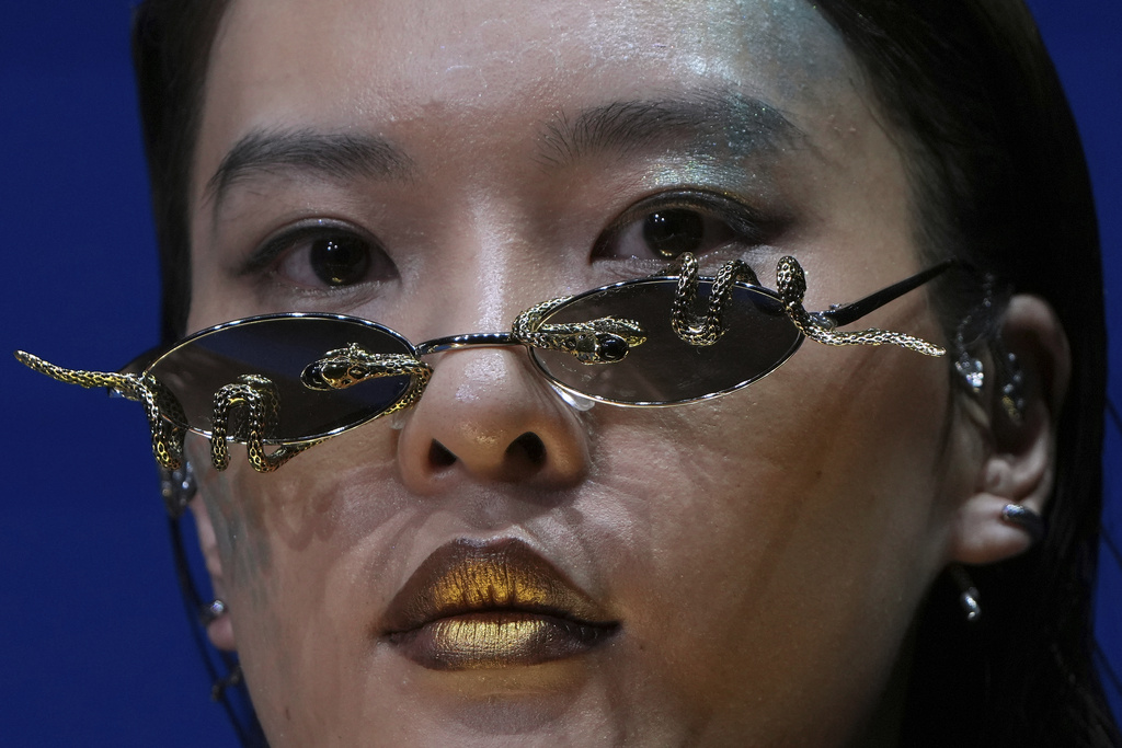 A model presents a creation by Maggie Ma collection during the SS2026 China Fashion Week, in Beijing, China, Tuesday, Sept. 9, 2025. (AP Photo/Andy Wong)