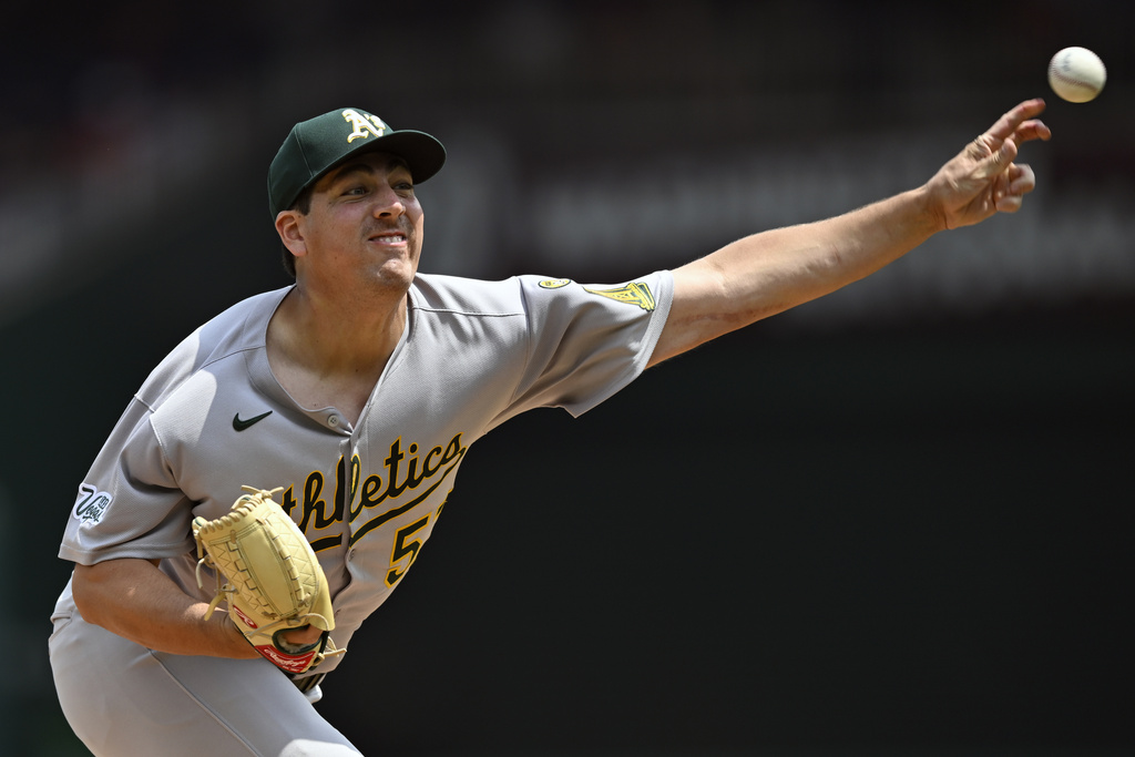 Athletics starting pitcher Jacob Lopez throws during the second inning of a baseball game against the Washington Nationals, Thursday, Aug. 7, 2025, in Washington. (AP Photo/John McDonnell)