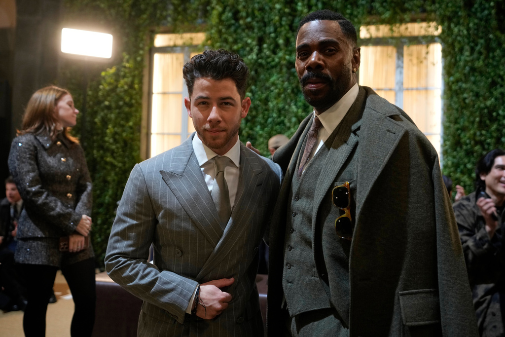 Nick Jonas, left, poses with Colman Domingo as they attend Ralph Lauren Fall/Winter 2026-2027 Men's fashion show presented in Milan, Italy, Friday, Jan. 16, 2026. (AP Photo/Luca Bruno)