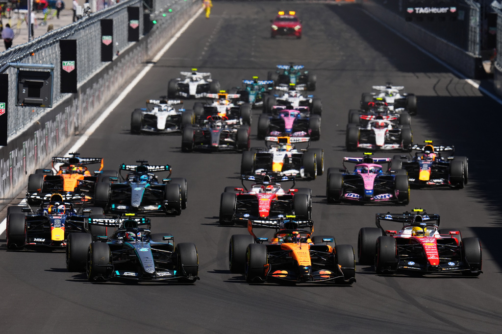 McLaren driver Lando Norris of Britain, center, leads the field after the start of the Spanish Formula One Grand Prix race in Madrid, Sunday, Sept. 13, 2026. (AP Photo/Manu Fernandez)