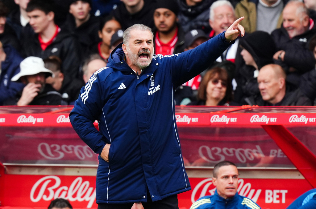 Nottingham Forest head coach Ange Postecoglou shouts instructions, during the English Premier League soccer match between Nottingham Forest and Chelsea, in Nottingham, England, Saturday, Oct. 18, 2025. (Mike Egerton/PA via AP)