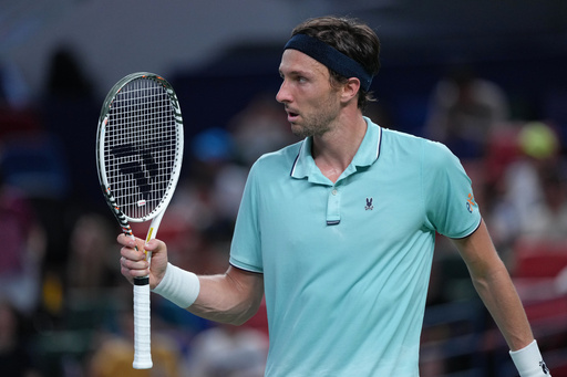 Arthur Rinderknech of France reacts after scoring a point against Alexander Zverev of Germany during the men's singles match of the Shanghai Masters tennis tournament at Qizhong Forest Sports City Tennis Center, in Shanghai, China, Monday, October. 6, 2025. (AP Photo/Andy Wong) Arthur Rinderknech of France reacts after scoring a point against Alexander Zverev of Germany during the men's singles match of the Shanghai Masters tennis tournament at Qizhong Forest Sports City Tennis Center, in Shanghai, China, Monday, October. 6, 2025. (AP Photo/Andy Wong)