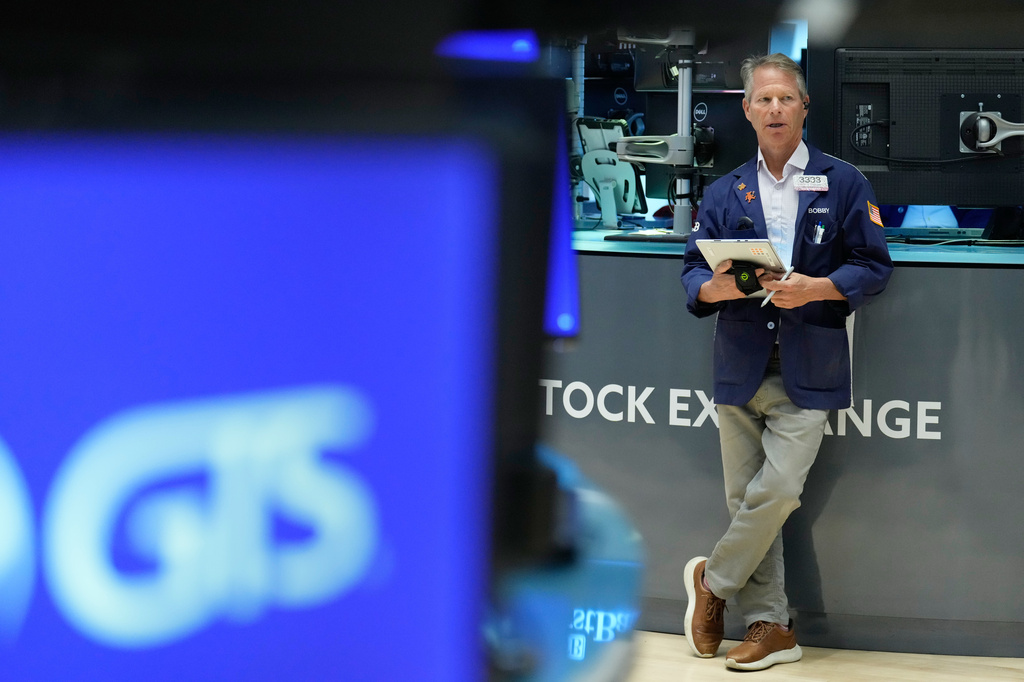 Bobby Charmak works on the floor at the New York Stock Exchange in New York, Monday, Sept. 14, 2026. (AP Photo/Seth Wenig)
