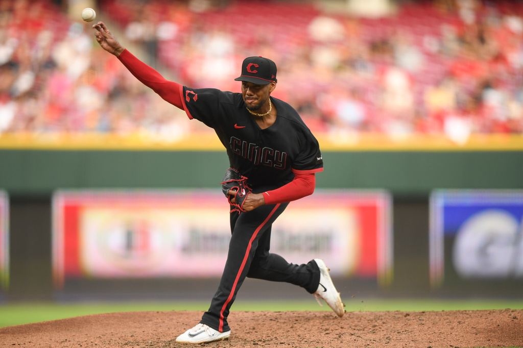 Cincinnati Reds' Hunter Greene pitches during the third inning of a baseball game against the Pittsburgh Pirates on Friday, July 31, 2026 in Cincinnati. (AP Photo/Tanner Pearson)