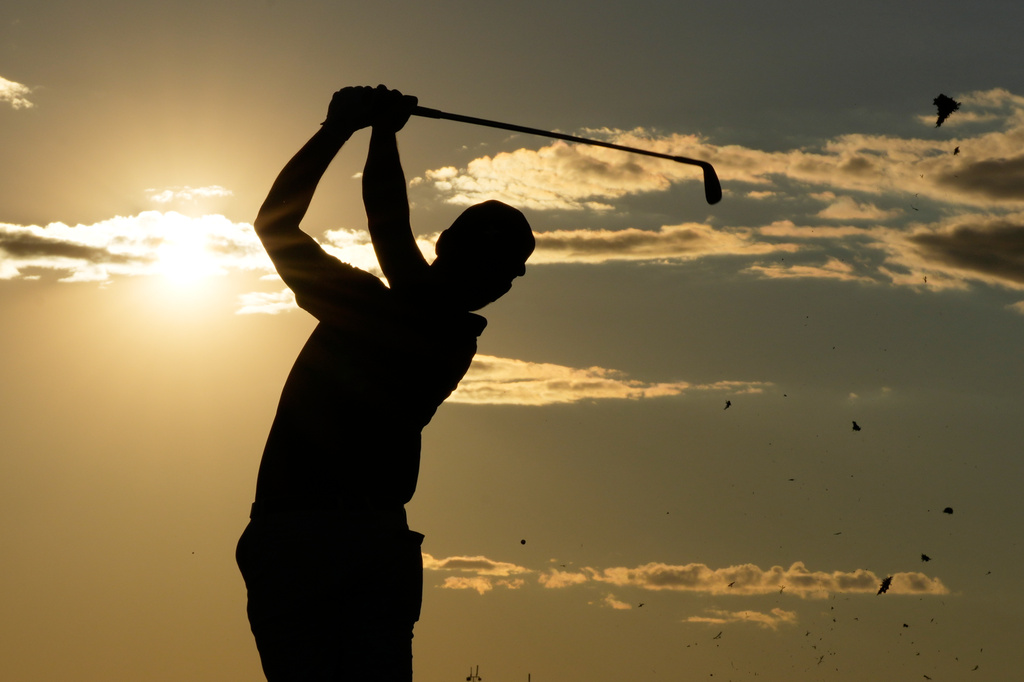 Sam Stevens watches his tee shot on the 17th hole during the third round of the U.S. Open golf tournament at Shinnecock Hills Golf Club in Southampton, N.Y., Saturday, June 20, 2026. (AP Photo/Seth Wenig)
