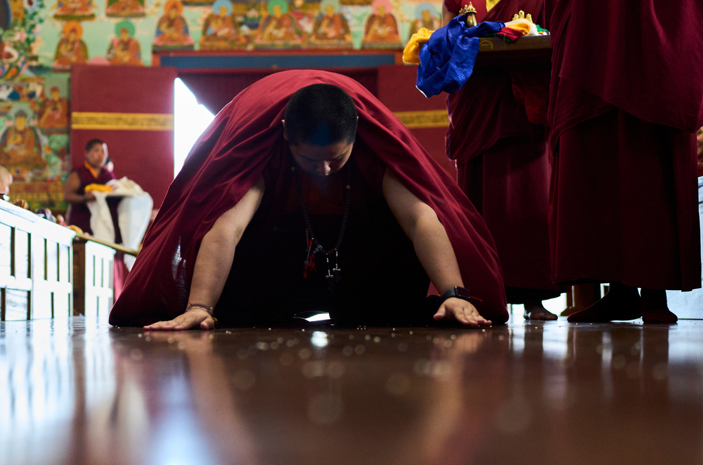 Jalue Dorje offers prayers during a ritual with other monks at Dzarong Thubten Mindrol Dongä Monastery in Kathmandu, Nepal, Tuesday, April 14, 2026. (AP Photo/Niranjan Shrestha)