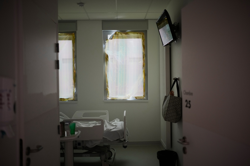 A heat-protection is set on a window at the emergency department of the Paris-Saclay Hospital, outside Paris, Tuesday June 30, 2026. (AP Photo/Christophe Ena )