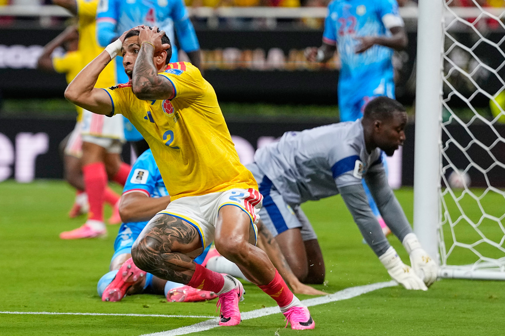 Colombia's Daniel Munoz (2) reacts after a missed shot at goal during the World Cup Group K soccer match between Colombia and Congo in Zapopan, near Guadalajara, Mexico, Tuesday, June 23, 2026. (AP Photo/Natacha Pisarenko)