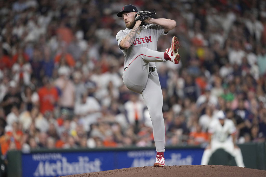 Boston Red Sox starting pitcher Garrett Crochet throws against the Houston Astros during the first inning of a baseball game Monday, Aug. 11, 2025, in Houston. (AP Photo/David J. Phillip)