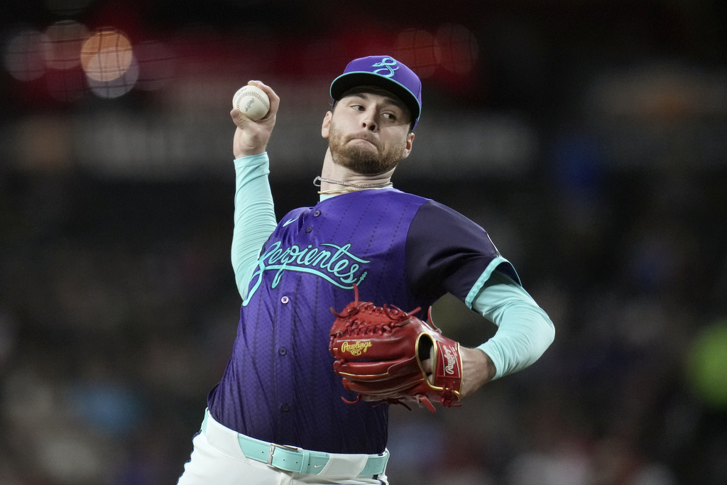 Arizona Diamondbacks starting pitcher Ryne Nelson throws against the Philadelphia Phillies during the first inning of a baseball game Friday, Sept. 19, 2025, in Phoenix. (AP Photo/Ross D. Franklin)