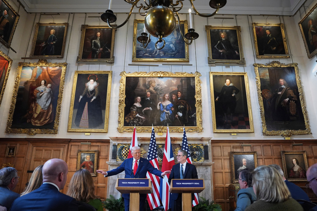 FILE - President Donald Trump gestures next to Britain's Prime Minister Keir Starmer during a joint press conference at Chequers near Aylesbury, England, Thursday, Sept. 18, 2025. (AP Photo/Evan Vucci, File)