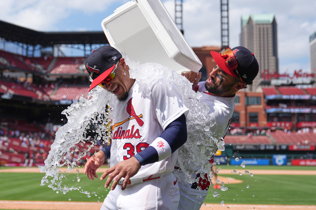 St. Louis Cardinals' Bryan Torres, left, is doused by teammate José Fermín following a baseball game against the Miami Marlins Sunday, June 28, 2026, in St. Louis. (AP Photo/Jeff Roberson)