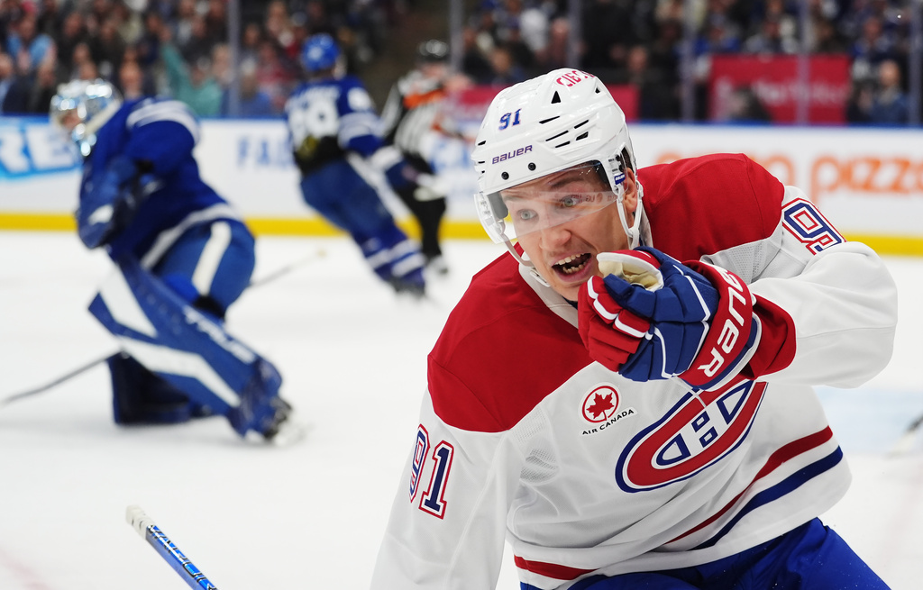 Montreal Canadiens' Oliver Kapanen (91) celebrates his goal against Toronto Maple Leafs goaltender Anthony Stolarz (41) during first period NHL hockey action in Toronto, Canada on Wednesday, Oct. 8, 2025. (Frank Gunn/The Canadian Press via AP)