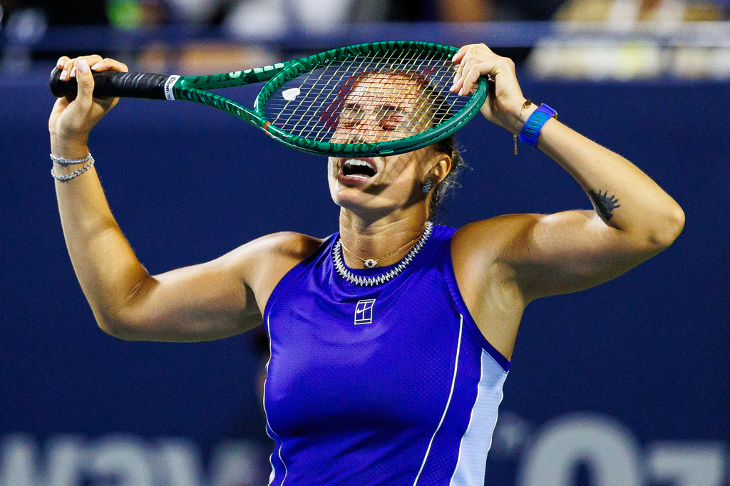 Aryna Sabalenka reacts during a match against Ekaterina Alexandrova during round of 16 National Bank Open Tennis game in Toronto, on Saturday, Aug. 8, 2026. (Keito Newman/The Canadian Press via AP)