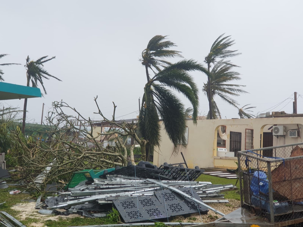 Debris covers the ground in Saipan on Wednesday, April 15, 2026, as a super typhoon with ferocious winds and relentless rains, shredded tin roofs and forced residents to take cover from flying tree limbs. (Office of the Mayor, municipality of Saipan via AP)