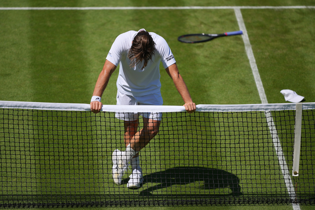 Arthur Fery of Britain reacts after winning the second round men's singles match against Otto Virtanen of Finland at the Wimbledon Tennis Championships in London, Thursday, July 2, 2026.(AP Photo/Kin Cheung)