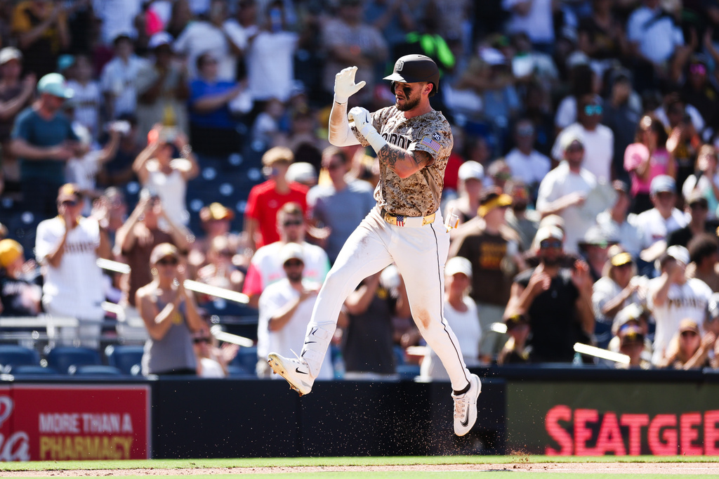 San Diego Padres' Jackson Merrill runs the bases after hitting a solo home run against the Minnesota Twins in the seventh inning of a baseball game Sunday, Aug. 23, 2026, in San Diego. (AP Photo/Derrick Tuskan)