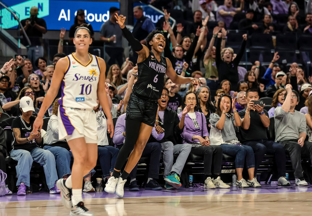 Golden State Valkyries' Kaila Charles (6) celebrates after a 3-point basket against the Los Angeles Sparks in the first half of a WNBA basketball game Monday, June 15, 2026, in San Francisco. (Carlos Avila Gonzalez/San Francisco Chronicle via AP)