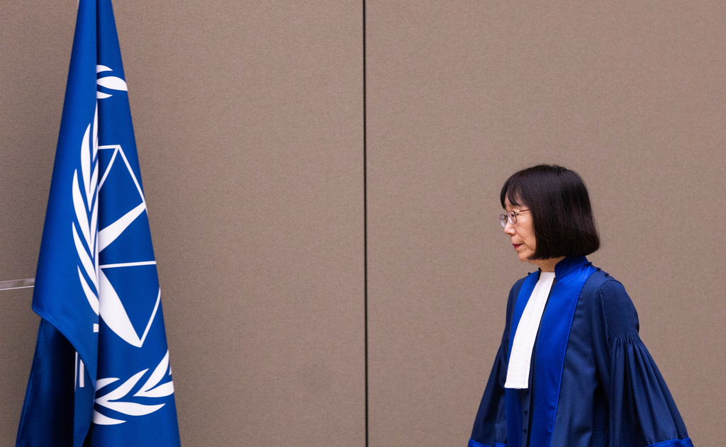 FILE - Judge Tomoko Akane walks before delivering the verdict in the Al Hassan case at the International Criminal Court in The Hague, Netherlands, Wednesday Nov. 20, 2024. (Eva Plevier/Pool Photo via AP, file)