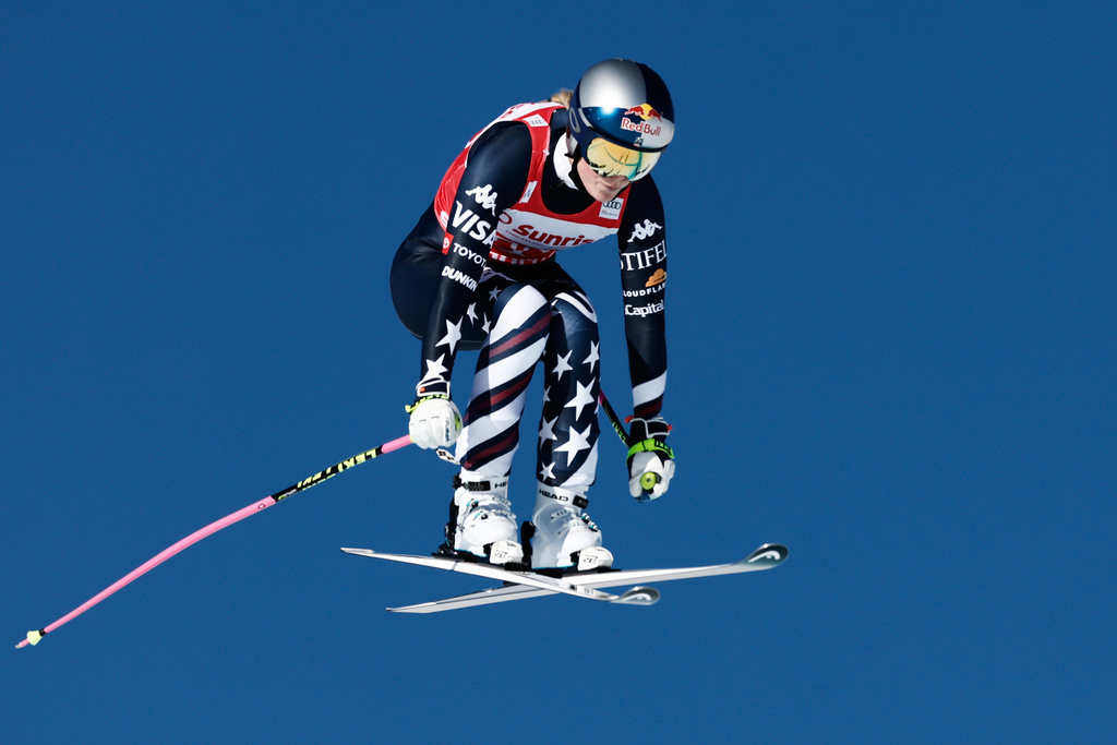 United States' Lindsey Vonn speeds down the course during an alpine ski, women's World Cup downhill, in St. Moritz, Switzerland, Saturday Dec. 13, 2025. (AP Photo/Gabriele Facciotti)