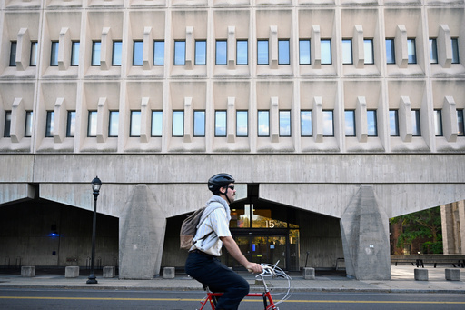 A bicyclist rides past the Becton Engineering and Applied Science Center at Yale University where Yale Professor Emeritus of Applied Physics Michel Devoret has an office and laboratory, Tuesday, Oct. 7, 2025, in New Haven, Conn. (AP Photo/Jessica Hill) A bicyclist rides past the Becton Engineering and Applied Science Center at Yale University where Yale Professor Emeritus of Applied Physics Michel Devoret has an office and laboratory, Tuesday, Oct. 7, 2025, in New Haven, Conn. (AP Photo/Jessica Hill)